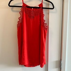 Bright red tank top